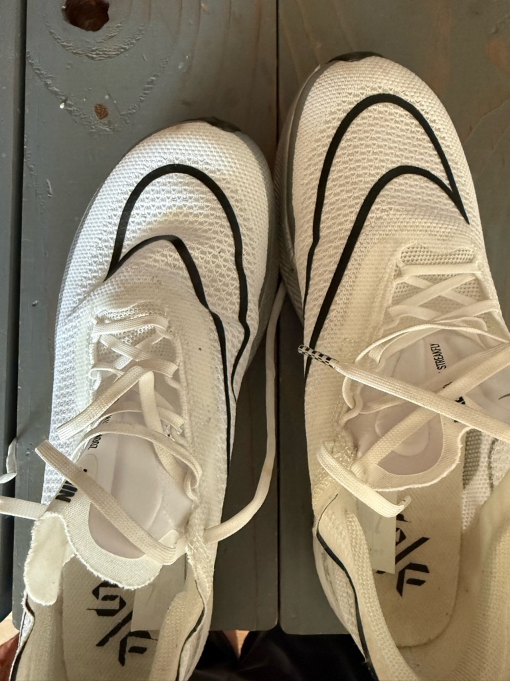 Nike White and Black Men's Running Sneakers with Swoosh Accents